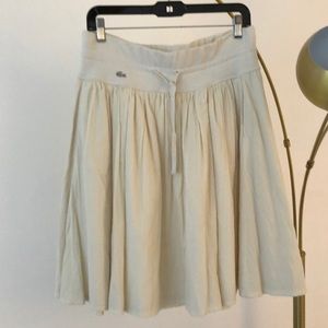 Lacoste cream colored skirt